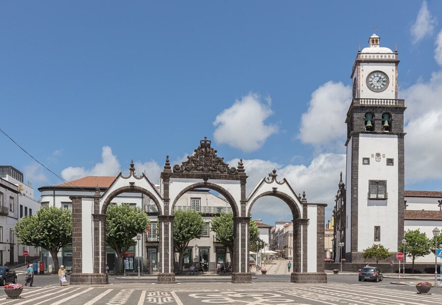Scenic view of Lagoa, Portugal, showcasing the town's architecture and landscape from the water's perspective.