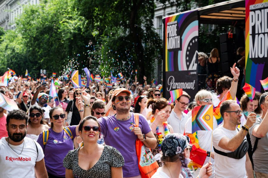 LGBTQ+ Pride Parade: vibrant, colorful crowd celebrating diversity, unity, and support for rights.