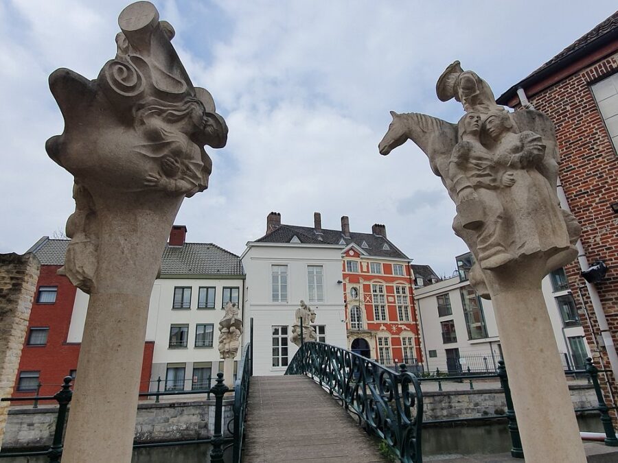 1. The Prinsenhof in Ghent, showcasing historic architecture and lush greenery in a serene urban setting.
