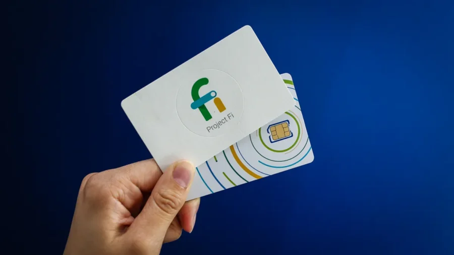 Google Fi cards showcasing vibrant logos and SIM card against a blue background.