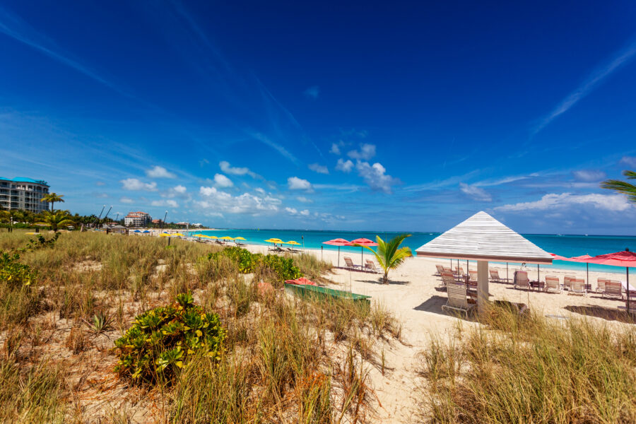 Sand dunes behind the long Grace Bay Beach in Providenciales, Turks and Caicos Islands