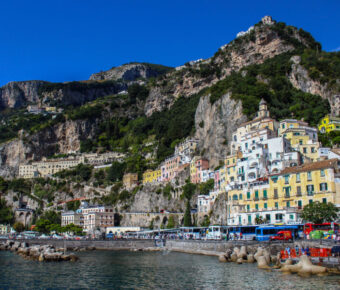 Scenic view of Atrani, a picturesque village on the Amalfi Coast, Italy, showcasing colorful buildings and coastal cliffs.