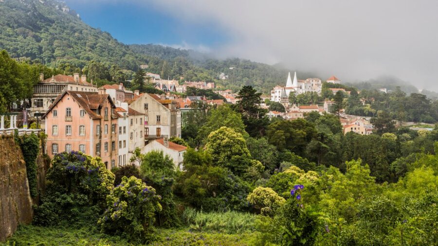 Quaint Sintra mountain town with picturesque hotels and lush scenery.