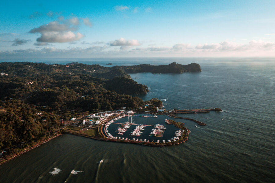 Aerial view of the charming marina of Quepos, Costa Rica, at dawn, with calm waters and coastal scenery