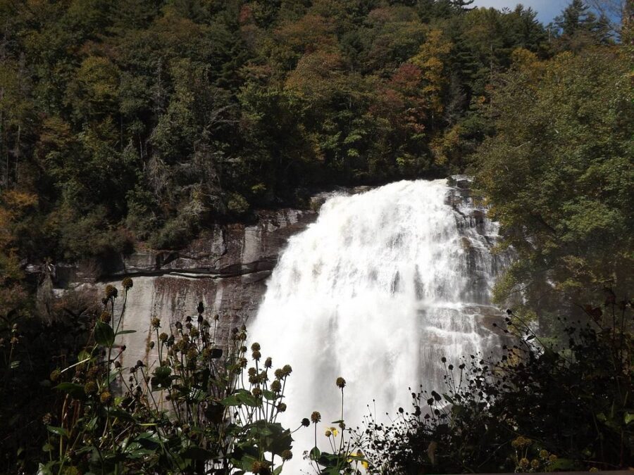 Rainbow Falls in Tennessee, cascading water seen from a train window.