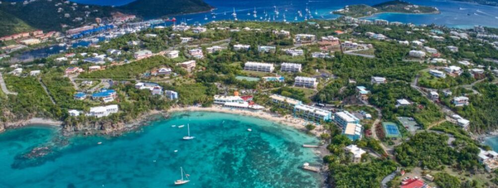 Scenic public beach near Red Hook, St. Thomas, showcasing soft sand and vibrant ocean views in the US Virgin Islands.