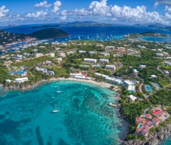 Scenic public beach near Red Hook, St. Thomas, showcasing soft sand and vibrant ocean views in the US Virgin Islands.