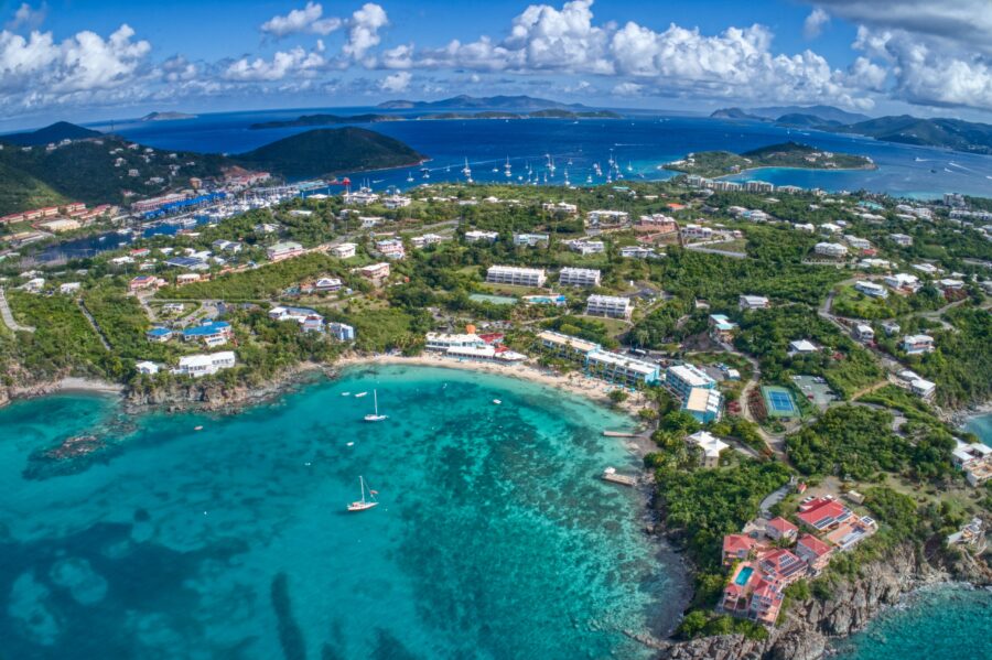 Aerial view of a public beach near Red Hook, showcasing turquoise waters and sandy shores in the US Virgin Islands