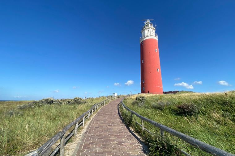 red lighthouse coastal path