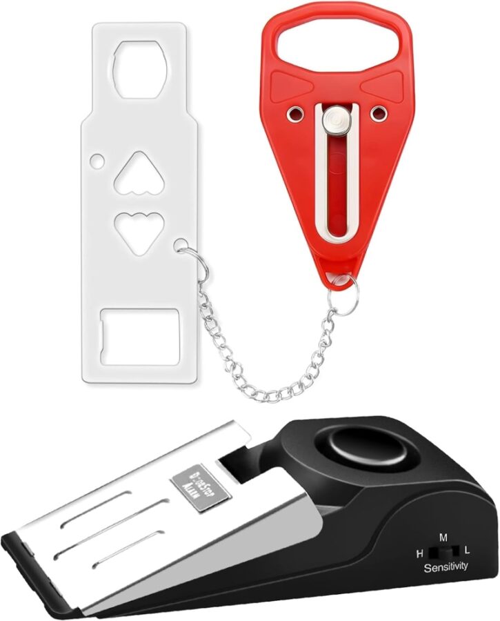 Red and black keychain featuring a key and metal clip, part of the Rerishom Dual Lock & Door Alarm Set.
