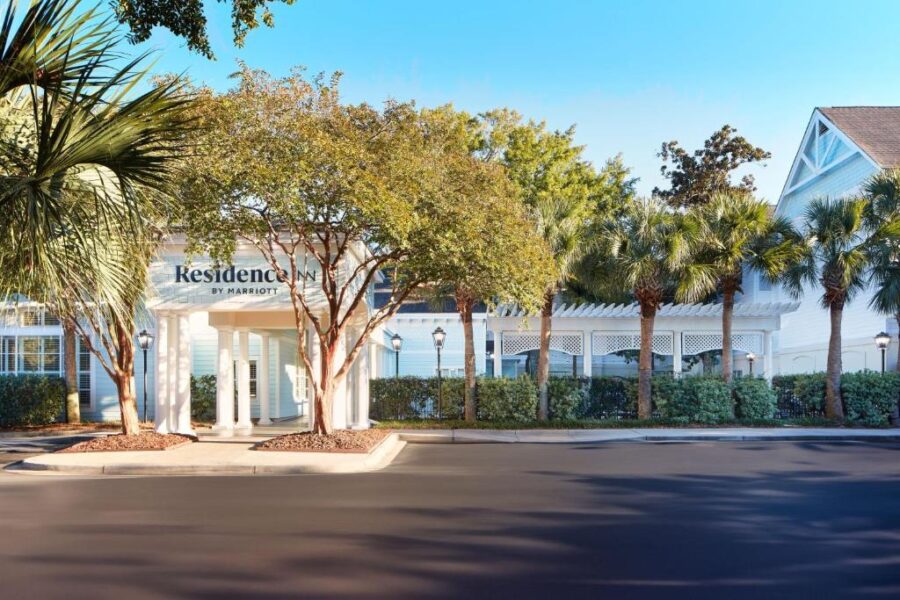 Front entrance of the Residence Inn by Marriott in Charleston, showcasing the welcoming facade and signage.
