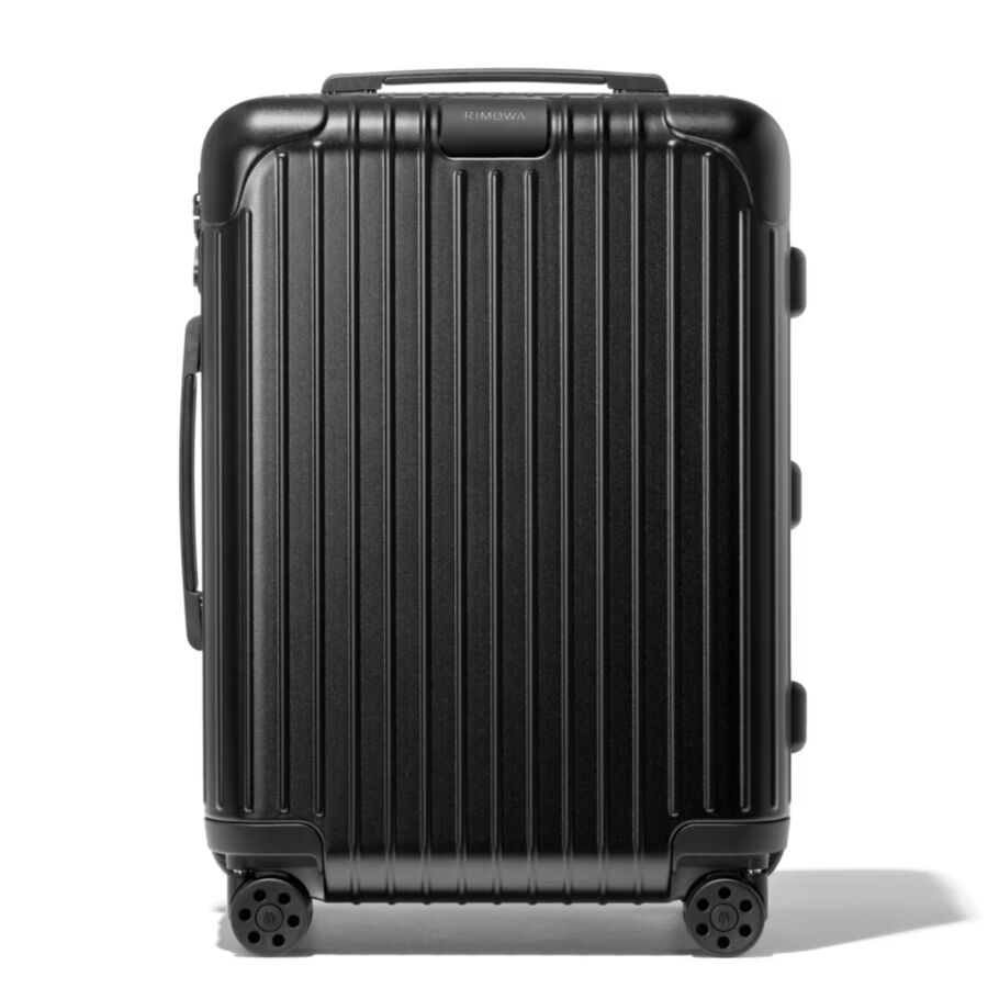 Black suitcase with wheels, the RIMOWA Essential Cabin model, displayed on a white background.