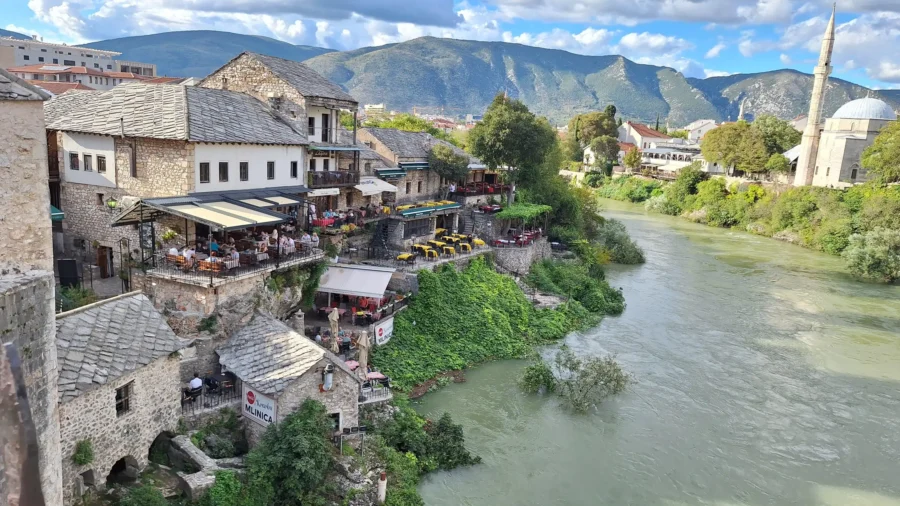 Picturesque riverside town with historic architecture, lush landscapes, and cultural diversity.