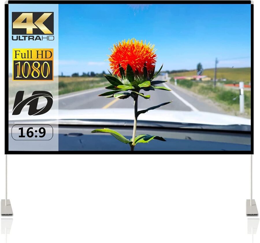 4K screen with orange flower on dashboard, scenic road view, portable projection screen display.