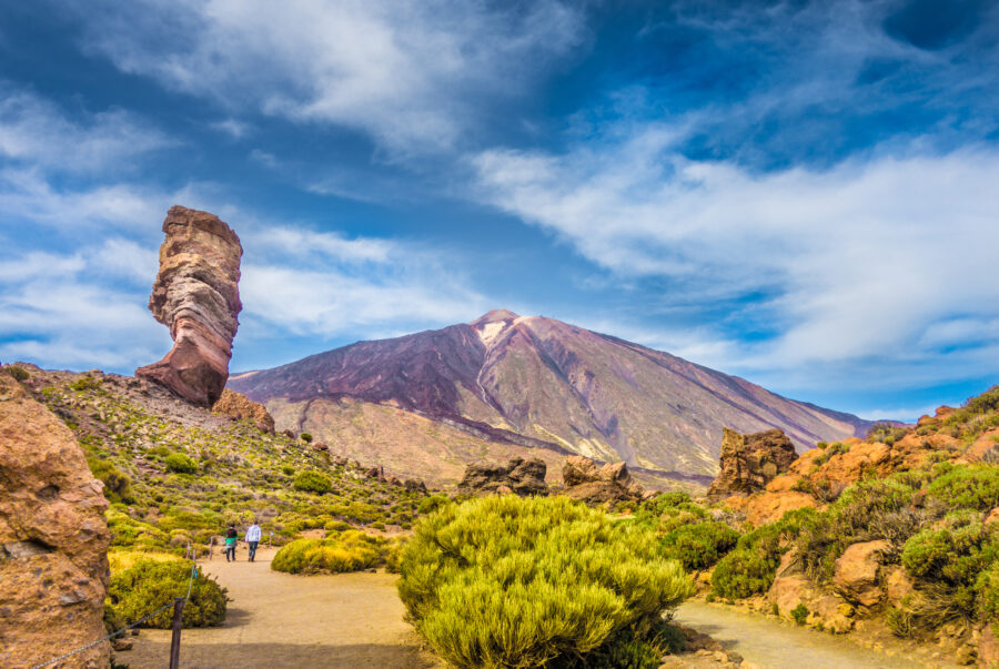 Roque Cinchado rock stands prominently with Pico del Teide in the background, set in the scenic Teide National Park, Tenerife