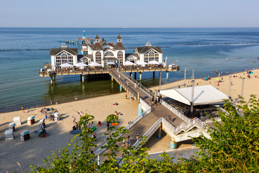 Pier extending into the Baltic Sea at the seaside resort of Sellin on Rügen Island, Germany, surrounded by calm waters
