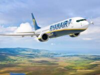 Ryanair BoeinsHow to Get Refund on Canceled Ryanair Flight: 5 Insider Steps for Fast Compensationg 737 flying over scenic European landscape with hills and ocean.