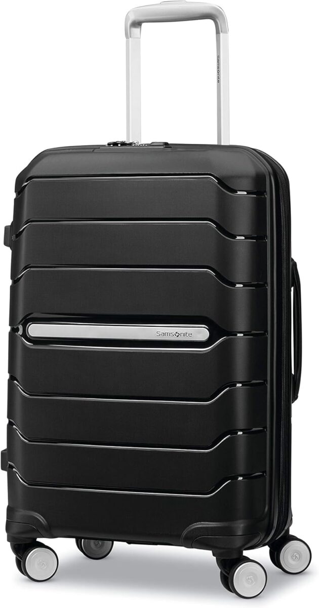 Black Samsonite Freeform hardside carry-on luggage with spinner wheels, designed for easy mobility and durability.