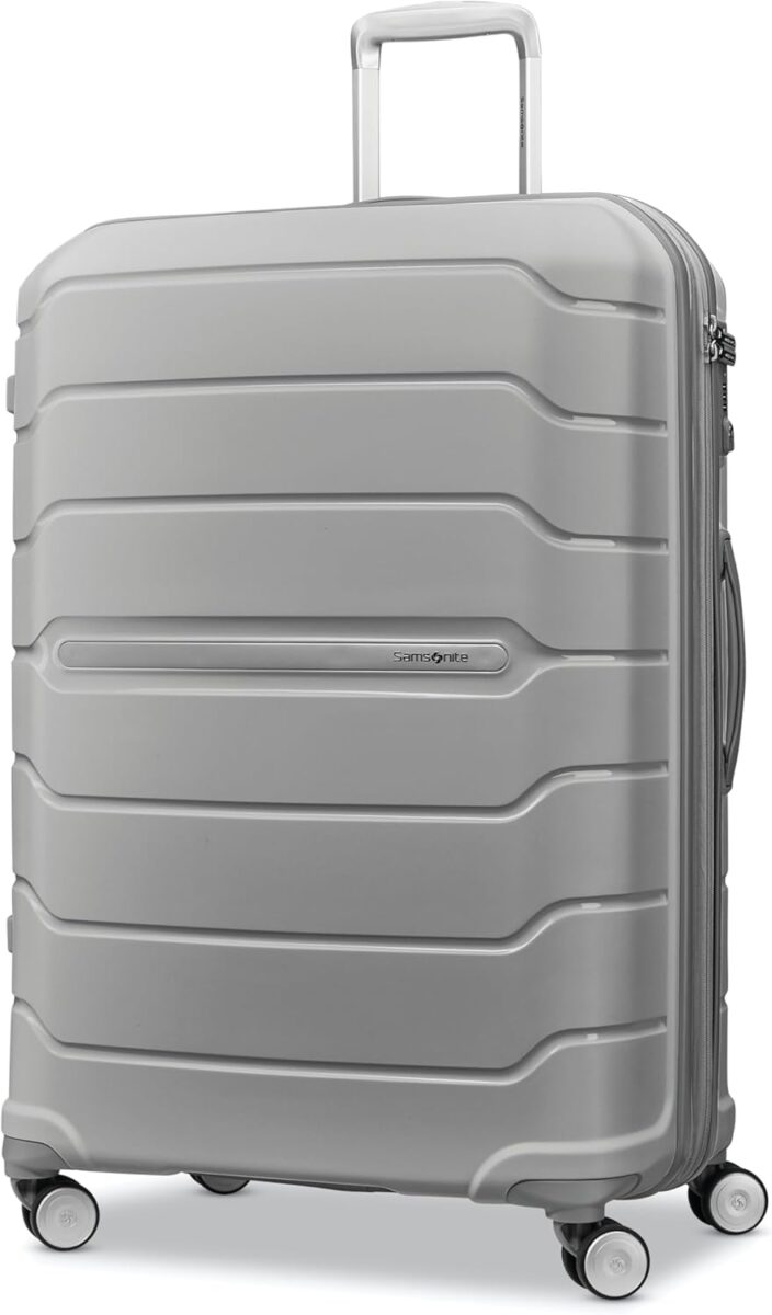 Grey Samsonite Freeform Large Checked spinner luggage, part of the Freeform collection, designed for large checked baggage.