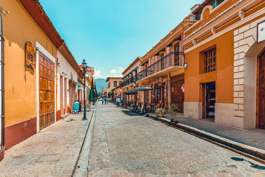 Colorful streets of San Cristobal de las Casas, Chiapas, Mexico, lined with traditional buildings and vibrant local culture