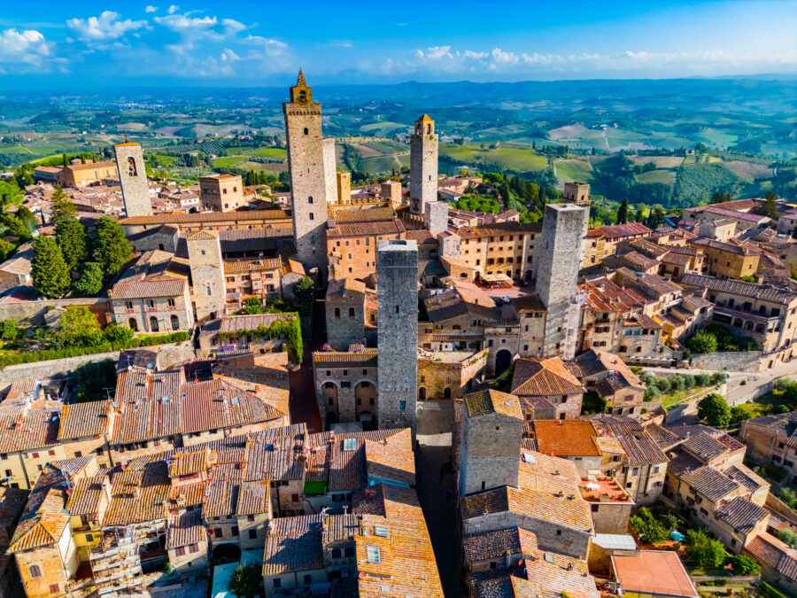 Aerial view of San Gimignano, showcasing its medieval towers and picturesque landscape in Tuscany, Italy