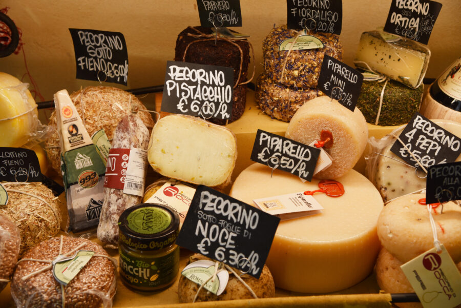 Italian food and wine displayed in various stores in San Gimignano, Tuscany, Italy