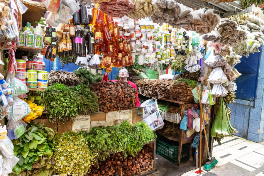 Colorful display of fresh vegetables at a bustling market in San Jose, Costa Rica, highlighting local agricultural goods