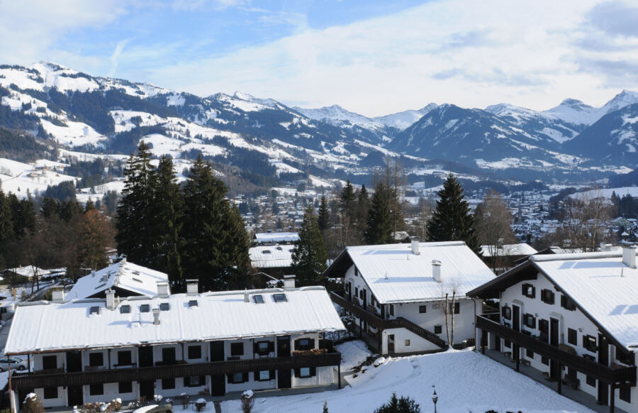 Panoramic view of the snow-covered mountains as seen from Schlosshotel Lebenberg in Kitzbühel, Austria
