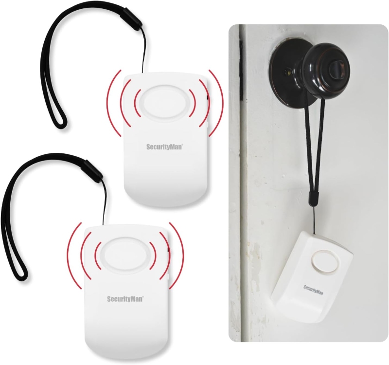 Two wireless doorbells and a remote control, featuring the Securityman Portable Door Handle Alarm for added security.