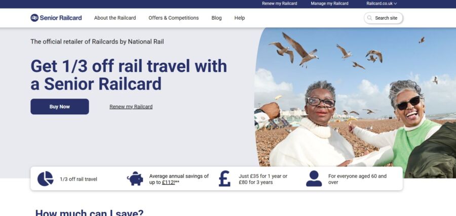 Senior Railcard website offers 1/3 off rail travel. Two smiling seniors enjoy a seaside view with flying seagulls.