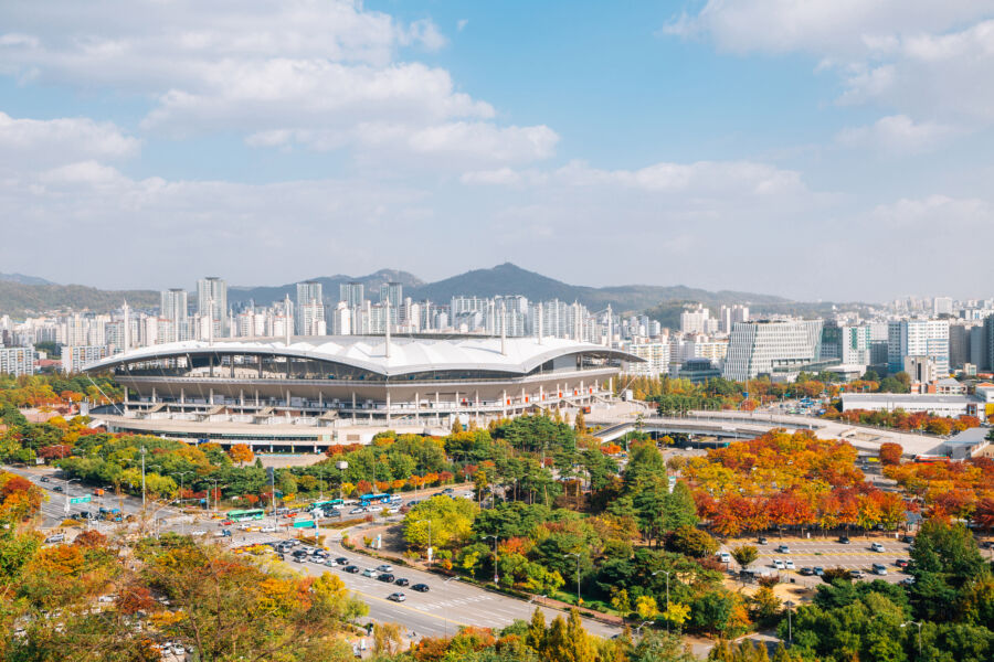 Panoramic view of Seoul World Cup Stadium and city skyline in autumn from Sky Park, showcasing vibrant fall foliage