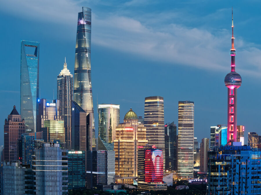 Modern Shanghai skyline showcasing the Shanghai Tower, Jin Mao Tower, and the iconic Oriental Pearl TV Tower