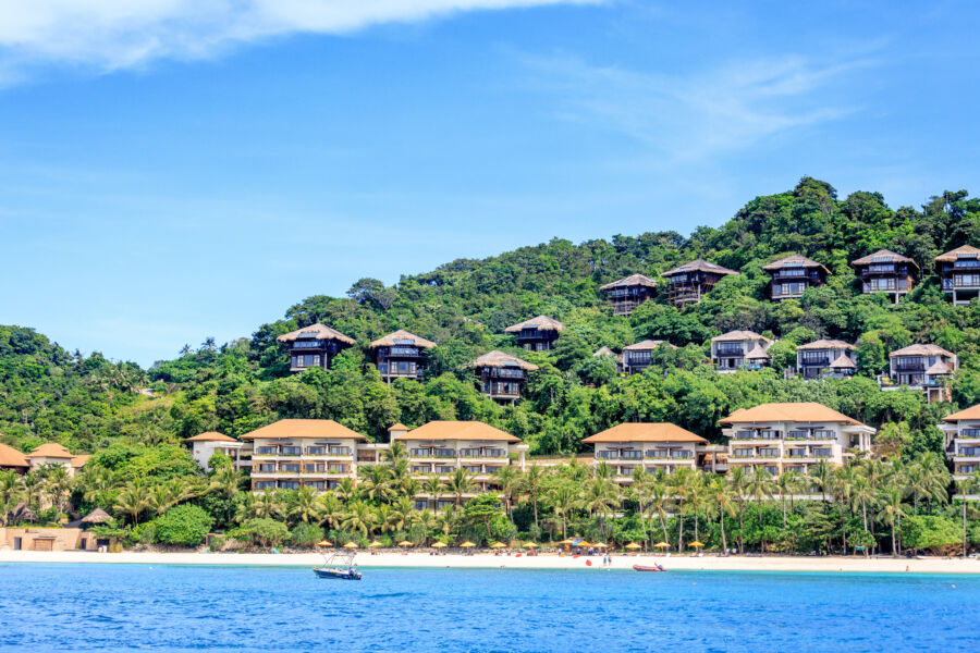 Scenic perspective of Shangri La Boracay Resort and Spa from the water, highlighting its elegant design and tropical surroundings