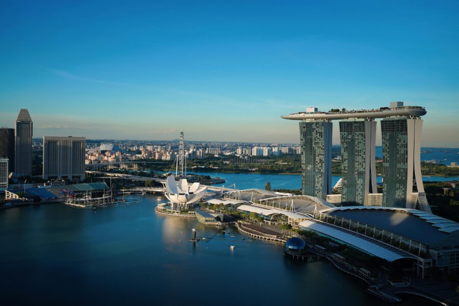 Singapore Marina Bay Sands skyline with skyscrapers and waterfront, blending modern architecture and nature.
