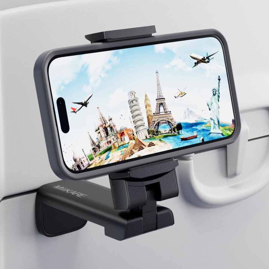 Travel seatback phone holder mount clips smartphone for hands-free in-flight viewing.