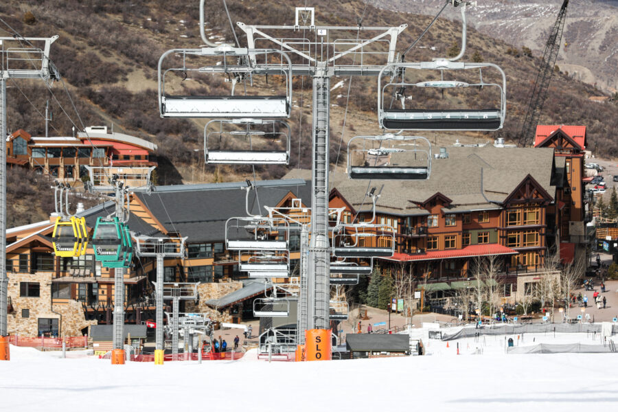 Snowmass ski resort in Aspen, Colorado, featuring ski lifts and snow-covered slopes