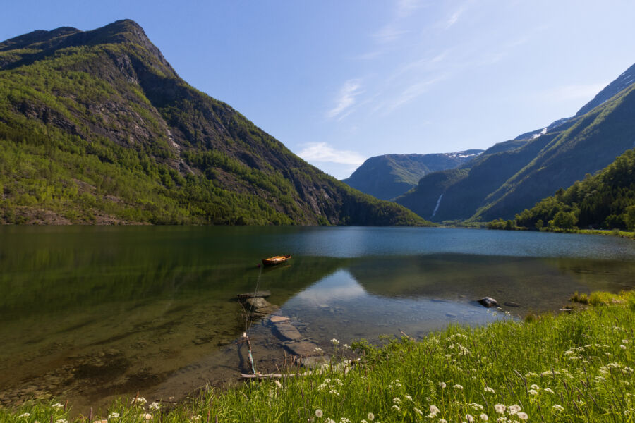 Stunning view of Skjolden fjord from Fortun Viewpoint, overlooking the serene Eidsvatnet lake in Norway