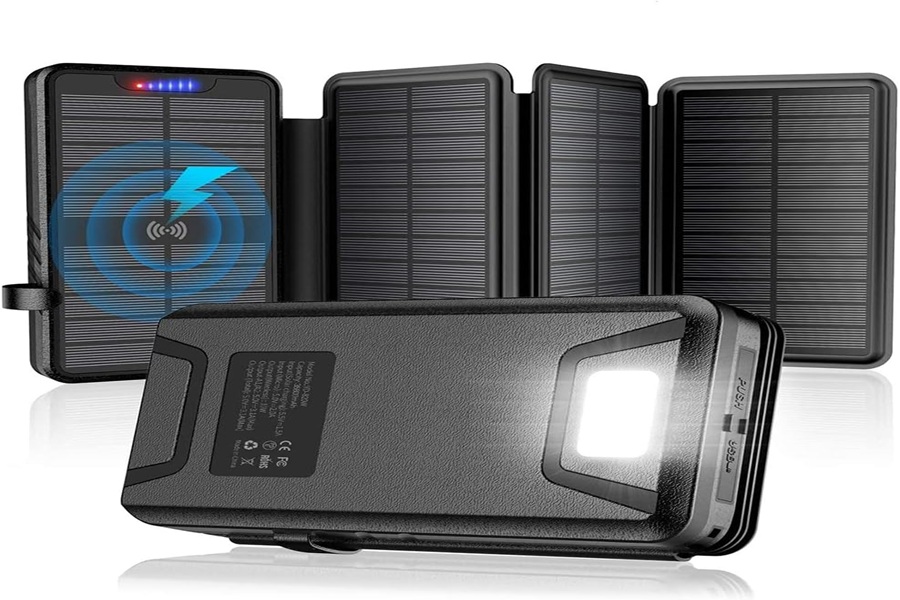 Portable solar power bank with wireless charging, LED indicators, and integrated flashlight.