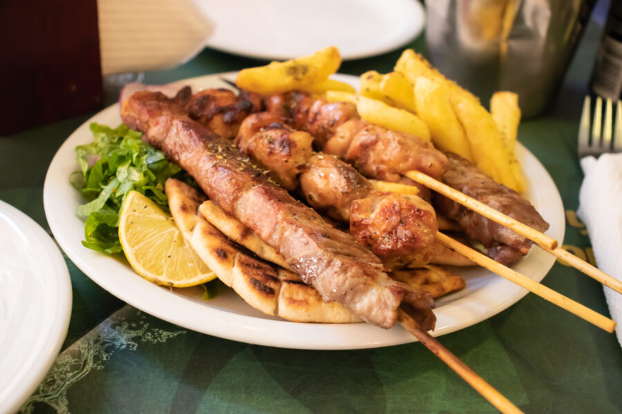 Close-up view of souvlaki, a traditional Greek dish with chicken and meat, captured in Athens