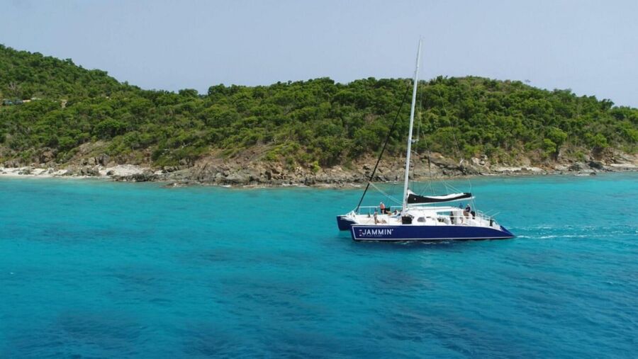 Catamaran sailing in the clear blue Caribbean waters, capturing the essence of the St. John Days End Sunset Sail.