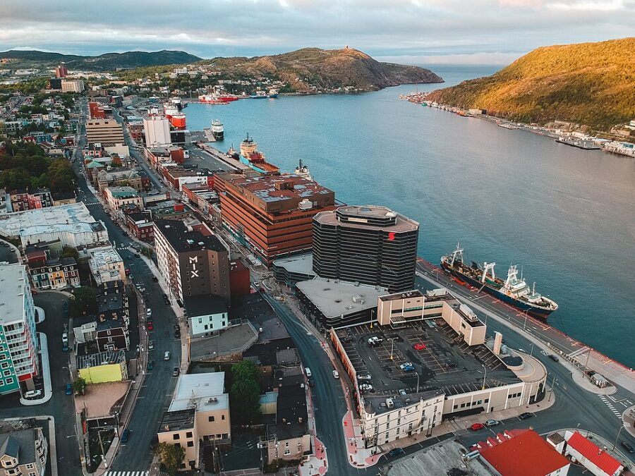 Aerial view of St. John's, Newfoundland and Labrador, showcasing the city's colorful buildings and coastal landscape.