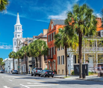 Exterior view of St. Michaels Church, a historic landmark in Charleston, South Carolina, featuring its tall steeple and classic design.