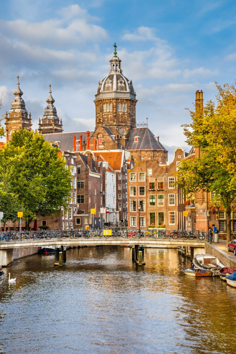 The St. Nicolas Church in Amsterdam showcases stunning architecture with its twin spires and ornate decorations.