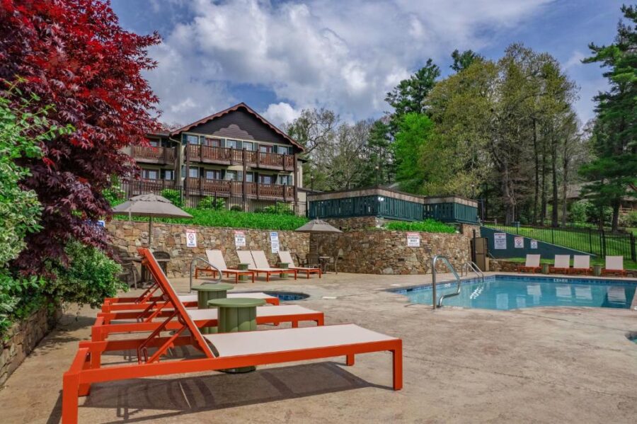 Scenic view of the lodge pool at Switzerland Inn, surrounded by the Smoky Mountains in North Carolina.