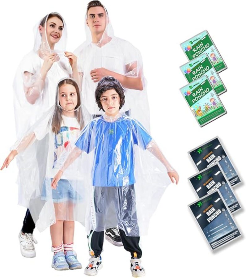 Family of three children and one adult wearing colorful plastic rain ponchos from the SWOGAA Extra Thick Rain Poncho Pack.