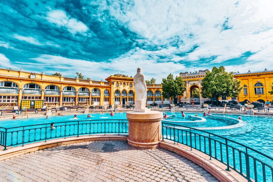 Szechenyi Baths courtyard, highlighting the stunning architecture and inviting environment of this renowned Hungarian thermal spa