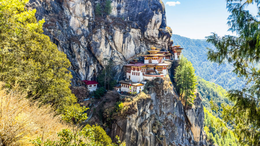 Panoramic view of Taktsang Monastery, also known as The Tiger's Nest, perched on a cliff in Paro, Bhutan