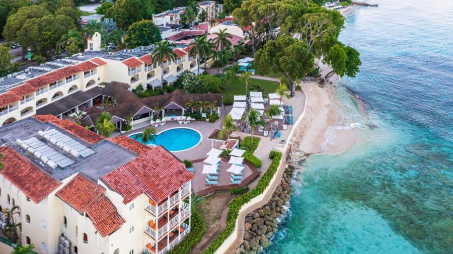 Aerial view of Tamarind Barbados Resort, showcasing the beach and lush surroundings of this all-inclusive destination.