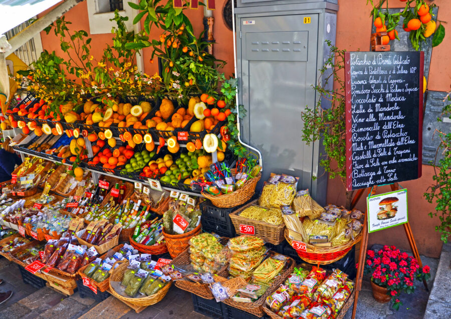 Various traditional Sicilian products showcased in Taormina, Italy, highlighting local cuisine and craftsmanship