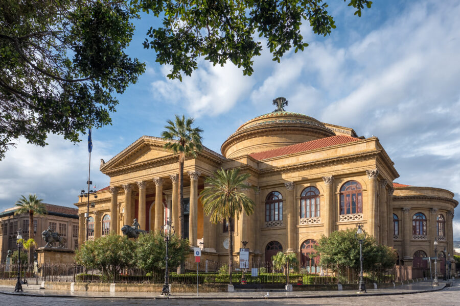 Exterior view of Teatro Massimo in Palermo, Sicily, featuring its impressive columns and ornate architectural details